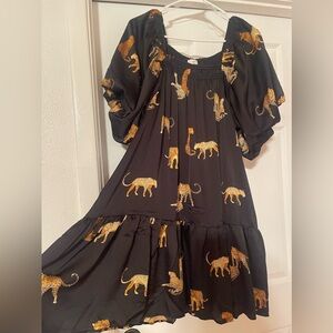 Black print dress with bell sleeves